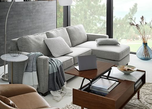 West Elm Henry 2-Piece Pull-Down Full Sleeper Sectional in neutral fabric with pull-down bed feature