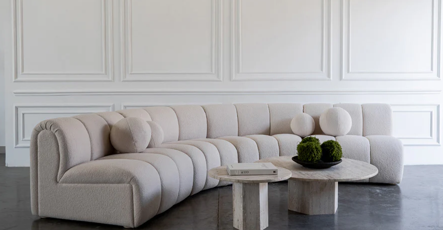 Image of the Ivy Bronx Keegan Sectional, a stylish and comfortable seating option for your living space