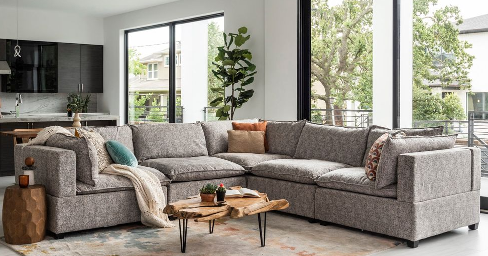 Image of Ashley Furniture Signature Design - Larkinhurst Traditional Sleeper Sectional Sofa, a comfortable and stylish addition to any living space