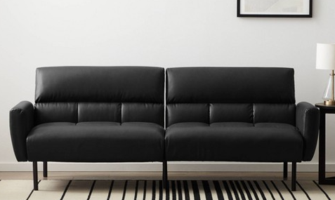 Room Essentials Faux Leather Futon in a modern living room setting