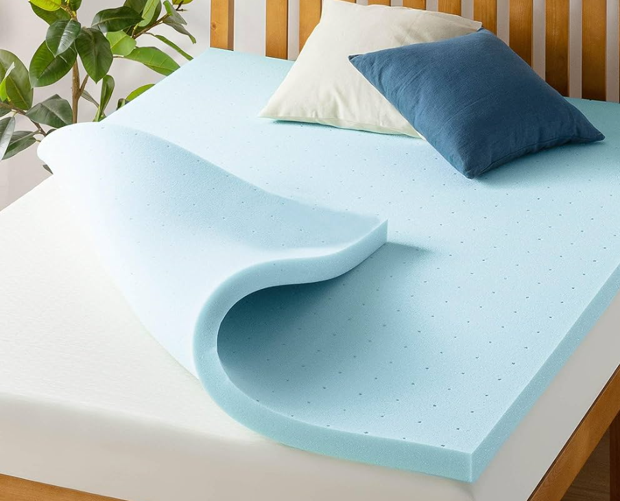 Zinus 1.5 Inch Green Tea Memory Foam Mattress Topper in a bedroom setting