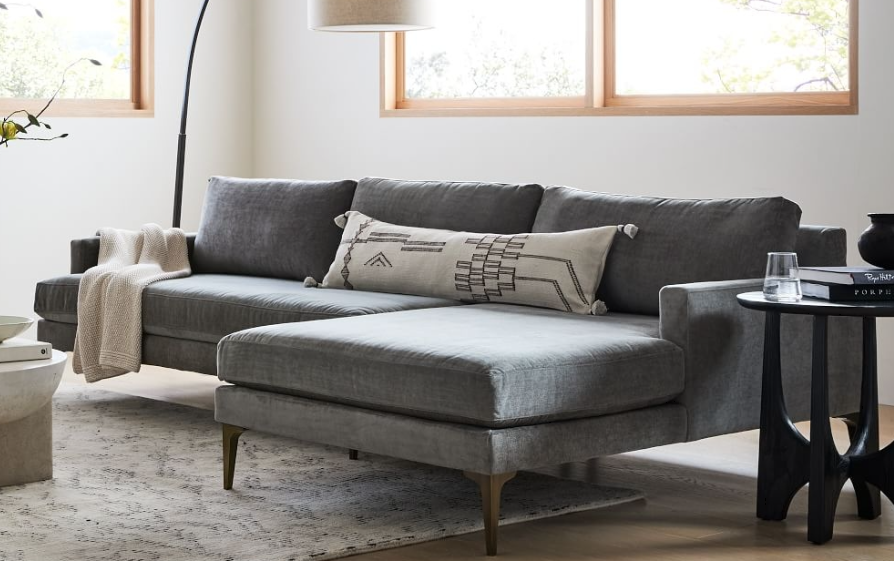 West Elm Andes Deco Velvet Sofa in a luxurious and elegant setting